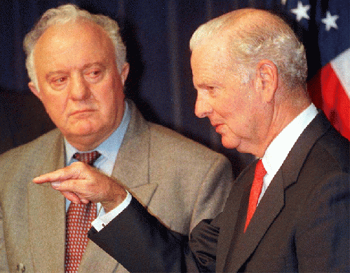 Former Secretary of State James Baker, III (R) and Republic of Georgia President Eduard Shevardnadze discuss the Kosovo conflict during a media briefing in Houston April 22, 1999, From ImagesAttr