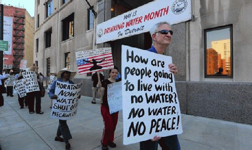 Protesters rallying outside Detroitâ€™s water department in May 2014., From ImagesAttr