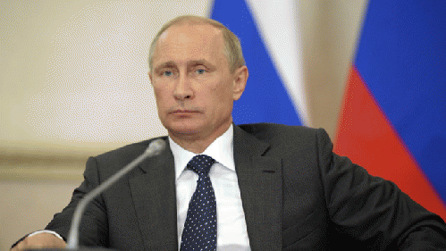 Russia's President Vladimir Putin attends a meeting in the Kremlin in Moscow, on June 20, 2014., From ImagesAttr