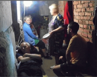 Donetsk citizens hide from Kiev government bombing, From ImagesAttr