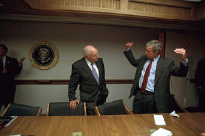 911: President George W. Bush and Vice President Cheney in President's Emergency Operations Center (PEOC), 09/11/2001.  Just wondering.  Are those titles reversed?  In any case, is Bush saying, .you did what?!?., From ImagesAttr