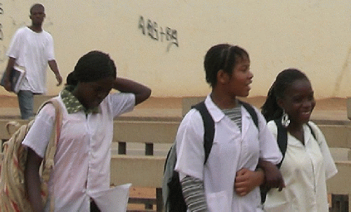 Teenage students walking to school in Luanda, Angola. According to the World Bank, the net enrollment rate in Angola in 2011 was of 86%., From ImagesAttr