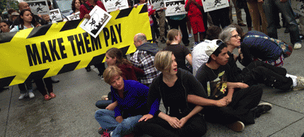 Protesters for better wages for fast-food workers gather outside McDonald's near Westlake Park last August.