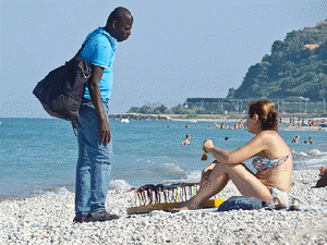 A contemporary European beach scene., From ImagesAttr