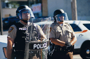 Police in riot gear at Ferguson protests, From ImagesAttr