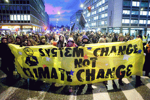 .System Change Not Climate Change. banner - United Nations Climate Change Conference - COP15 - Copenhagen, Denmark