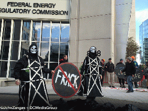 Protestors dress up as fracking wells in front of FERC