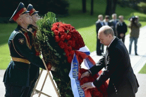 Russian President Vladimir Putin laying a wreath at Russia's Tomb of the Unknown Soldier on May 8, 2014, as part of the observance of the World War II Victory over Germany.