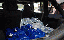 Car packed with water for desperate Detroit residents