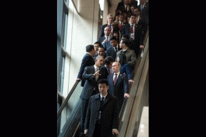 President Barack Obama talks with President Vladimir Putin of the Russian Federation as they join other leaders en route to the APEC Family Photo at the International Convention Center in Beijing, China, Nov. 11, 2014., From ImagesAttr