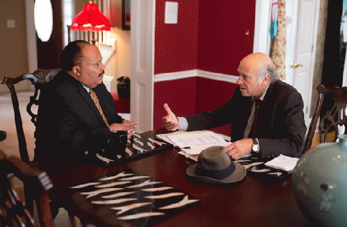 Greg Palast (right) and Martin Luther King III discuss CrossCheck and the state of voting rights in King's Atlanta home.