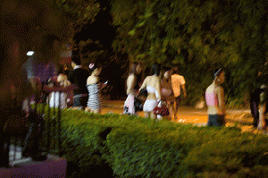 Prostitutes lined up waiting for johns, Singapore Red Light District, From ImagesAttr