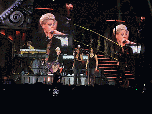 Pink, the best-selling pop singer, would probably be banned from most schools because of her hair. Pink, the best-selling pop singer, would probably be banned from most schools because of her hair.