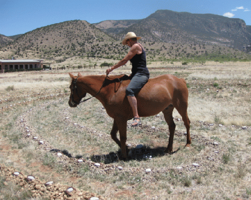 Cordelia Rose on Stretch in the Troy ride through labyrinth at Whitewater Mesa Labyrinths, 2014.