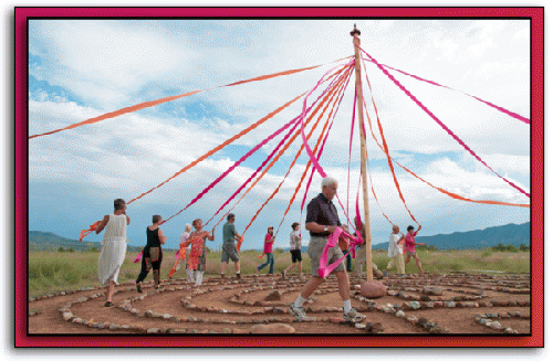 Dancing the maypole in the classic labyrinth at Whitewater Mesa Labyrinths, NM, 2012.