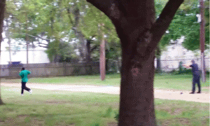 A screen-shot from a video showing Walter Scott being shot in the back by a North Charleston, South Carolina, police officer Michael Slager on April 4, 2015., From ImagesAttr