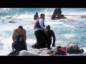 Greece migrants drown as boat runs aground off the Greek island of Rhodes, From ImagesAttr