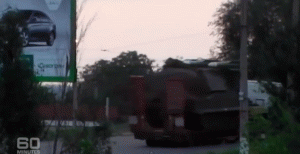 A screen shot from a video of a suspected BUK missile battery traveling on a road in eastern Ukraine after the July 17, 2014 shoot-down of Malaysia Airlines Flight 17., From ImagesAttr