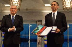 President Barack Obama uncomfortably accepting the Nobel Peace Prize from Committee Chairman Thorbjorn Jagland in Oslo, Norway, Dec. 10, 2009., From ImagesAttr