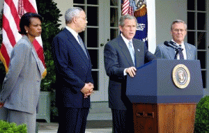 National Security Advisor Condoleezza Rice, Secretary of State Colin Powell, and Secretary of Defense Donald Rumsfeld listen to President George W. Bush speak about the Middle East on June 24, 2002., From ImagesAttr