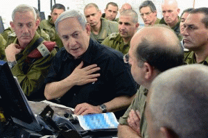 Prime Minister Benjamin Netanyahu held a security meeting with senior Israeli Defense Forces commanders near Gaza on July 21, 2014., From ImagesAttr