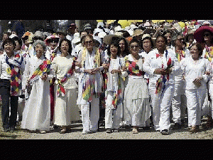 Peace activists cross the demilitarized zone that separates South and North Korea, From ImagesAttr