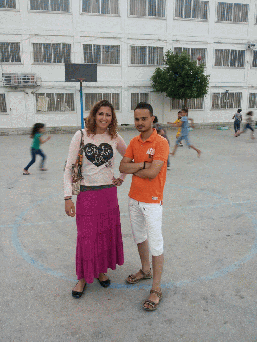 Wisam with the author outside of the UNRWA school in Baddawi Camp in Tripoli, From ImagesAttr