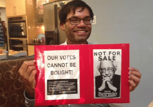 Bernie Supporter with sign he created and brought to the Bernie supporter gathering