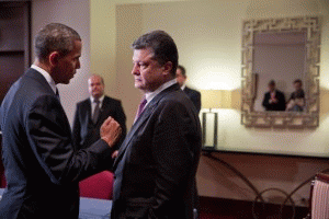 President Barack Obama and President Petro Poroshenko of Ukraine talk after statements to the press following their bilateral meeting at the Warsaw Marriott Hotel in Warsaw, Poland, June 4, 2014., From ImagesAttr