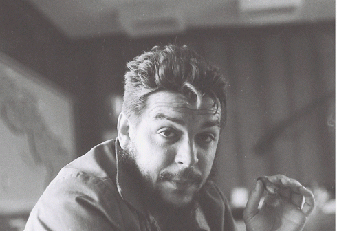 Che Guevara in his office at the planning ministry, in Fe ruary, 1964, From ImagesAttr