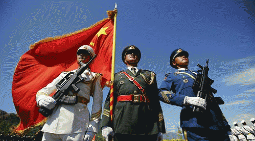 Officers and soldiers of China's People's Liberation Army hold a flag and weapons during a training session for a military parade to mark the 70th anniversary of the end of the World War Two, at a military base in Beijing, China, August 22, 2015., From ImagesAttr