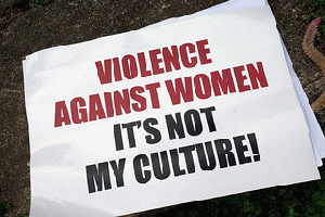 A sign from the Men Against Violence Against Women (MAVAW) project at the Live and Learn Offices., From ImagesAttr