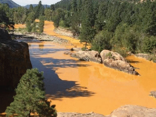 The mustard-colored Animas River is a gift of the EPA, which blundered in working on an abandoned gold mine and opened a Pandora's box of heavy metals., From ImagesAttr