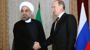 Iranian President Hassan Rouhani (left) shakes hands with Russian President Vladimir Putin at the Shanghai Cooperation Organization summit in the Kyrgyz capital of Bishkek on Sept. 13, 2013., From ImagesAttr