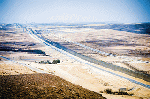 View of the Sinai overlooking Egypt from Mitzpe Bar-Lev and the Security fence in Southern Israel. View of the Sinai overlooking Egypt from Mitzpe Bar-Lev and the Security fence in Southern Israel.
