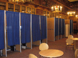 Voting booths (Public domain via Wikipedia) Voting booths (Public domain via Wikipedia)
