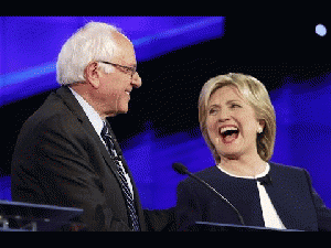 Bernie Sanders and  Hillary Clinton at the first Democratic debate, broadcast by CNN