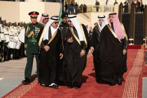 King Salman of Saudi Arabia and his entourage arrive to greet President Barack Obama and First Lady Michelle Obama at King Khalid International Airport in Riyadh, Saudi Arabia, Jan. 27, 2015., From ImagesAttr