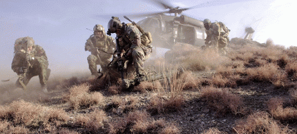 U.S. Special Operations personnel prepare to board a UH-60 Black Hawk helicopter during a mission in Kunar province, Afghanistan., From ImagesAttr