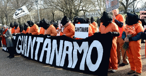 A January 2015 rally against the 14th year of Guantanamo torture. A January 2015 rally against the 14th year of Guantanamo torture.