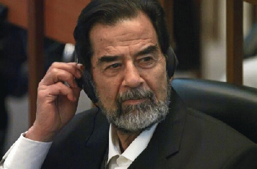 Saddam Hussein listens to charges during the kangaroo court proceedings in October of 2006. Saddam may not have been a cuddly guy, but a lot of people who sent him to the gallows are guilty of even worse crimes., From ImagesAttr