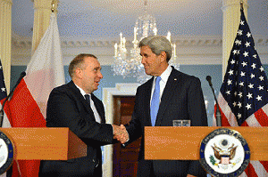 Secretary Kerry Shakes Hands With Polish Foreign Minister Schetyna After Commenting on the Terrorist Attack in Paris, From FlickrPhotos