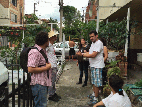 Javier Cardona showing visitors his garden, Espacio Vital, From ImagesAttr