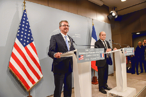 U.S. Defense Secretary Ash Carter, left, holds a press conference with French Defense Minister Jean-Yves Le Drian in Paris, Jan. 20, 2016., From ImagesAttr