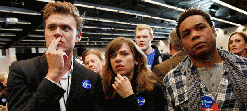 Supporters of Hillary Clinton monitored caucus results in Iowa as the night wore on., From ImagesAttr