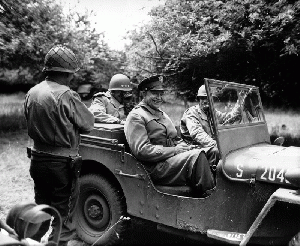 Eisenhower in a jeep in Normandy orchard