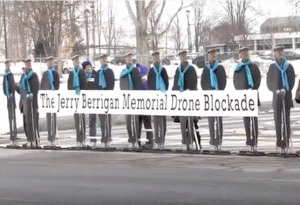 Life-size cut-outs of Jerry Berrigan arrayed to blockade at Hancock airbase in upstate New York on Jan. 28, 2016.