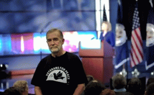 Army veteran and ex-CIA analyst Ray McGovern, standing in protest of a speech by Secretary of State Hillary Clinton on Feb. 15, 2011.