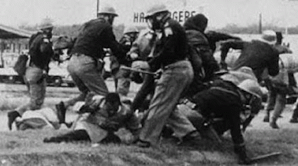 John Lewis, now a U.S. congressman, being attacked during the voting rights march in Selma, Alabama, in 1965, From ImagesAttr