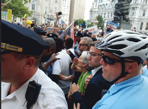 Jill Stein being escorted by Philly Police